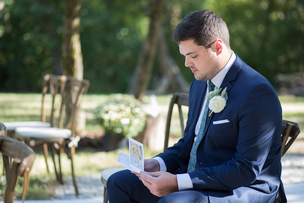 groom reading letter